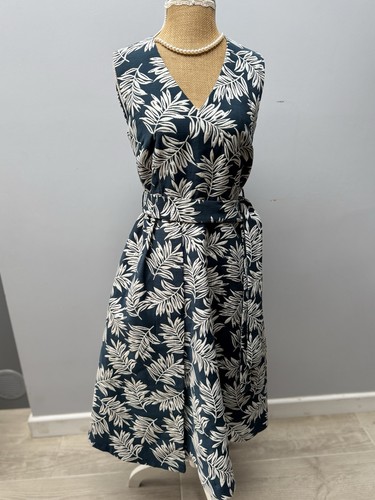 Per una dark teal leaf - una,